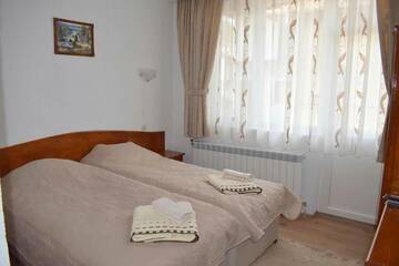 Фото номера Двухместный номер с 1 кроватью Гостевой дом Guest House Meraklii г. Smilyan 7